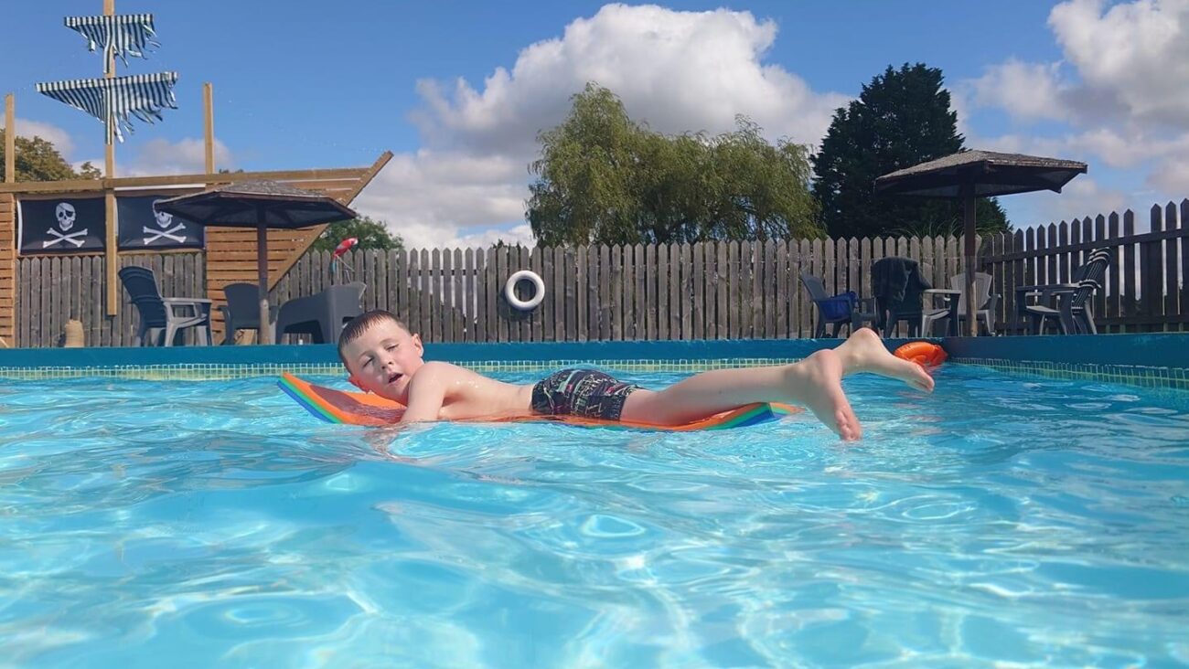 The outdoor heated swimming pool at Bank Farm Holiday Park