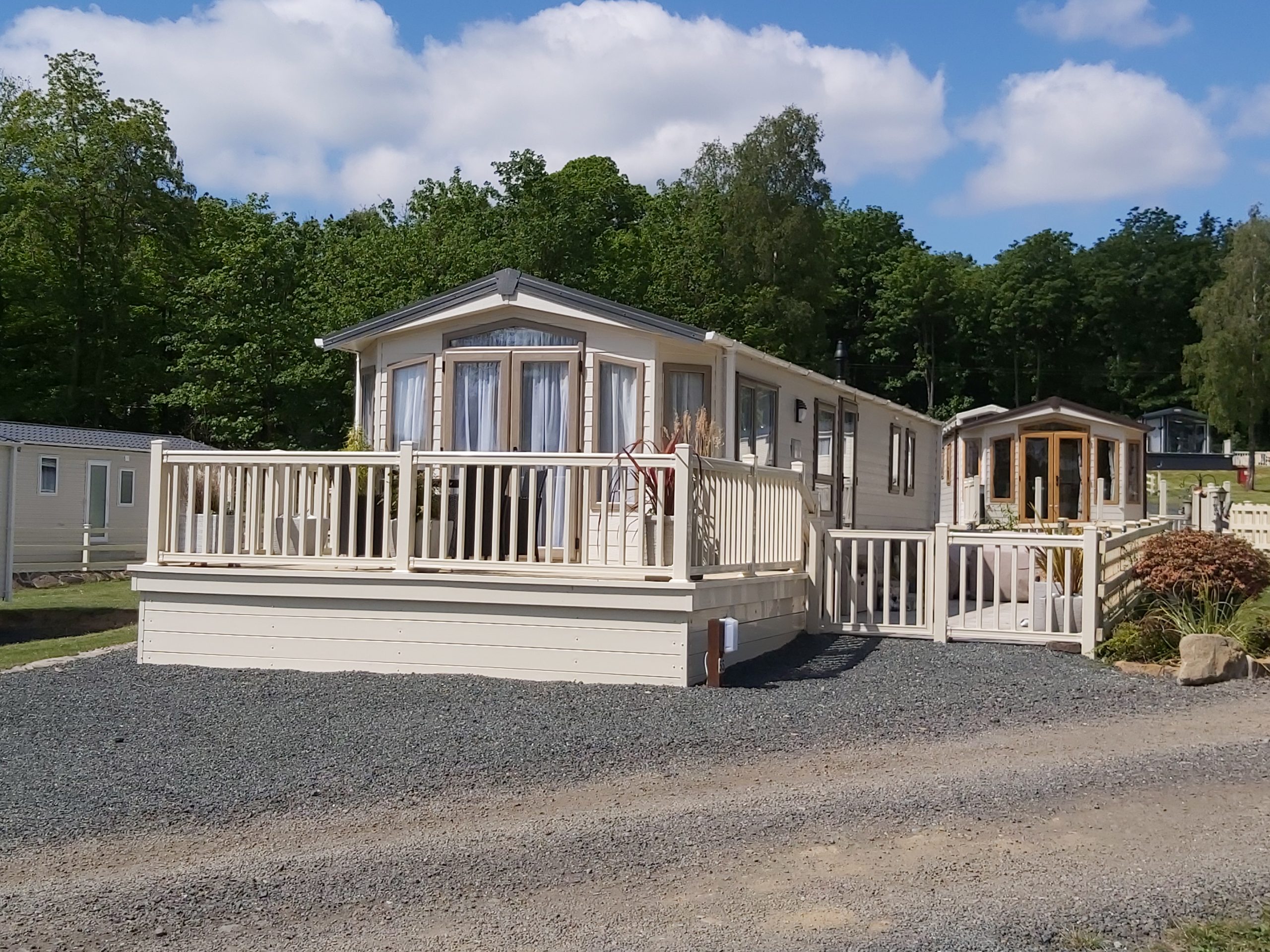 A static caravan with upvc decking and balustrade