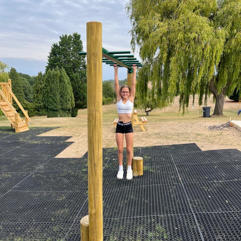 climbing frame with kiddies hanging