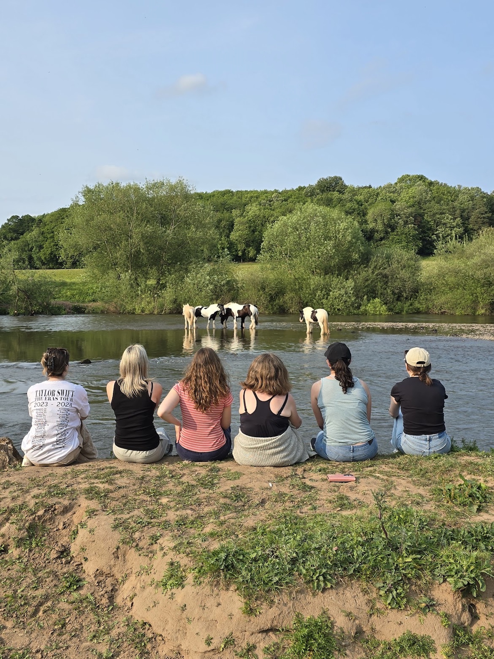 Equestrian guests enjoying the river bank