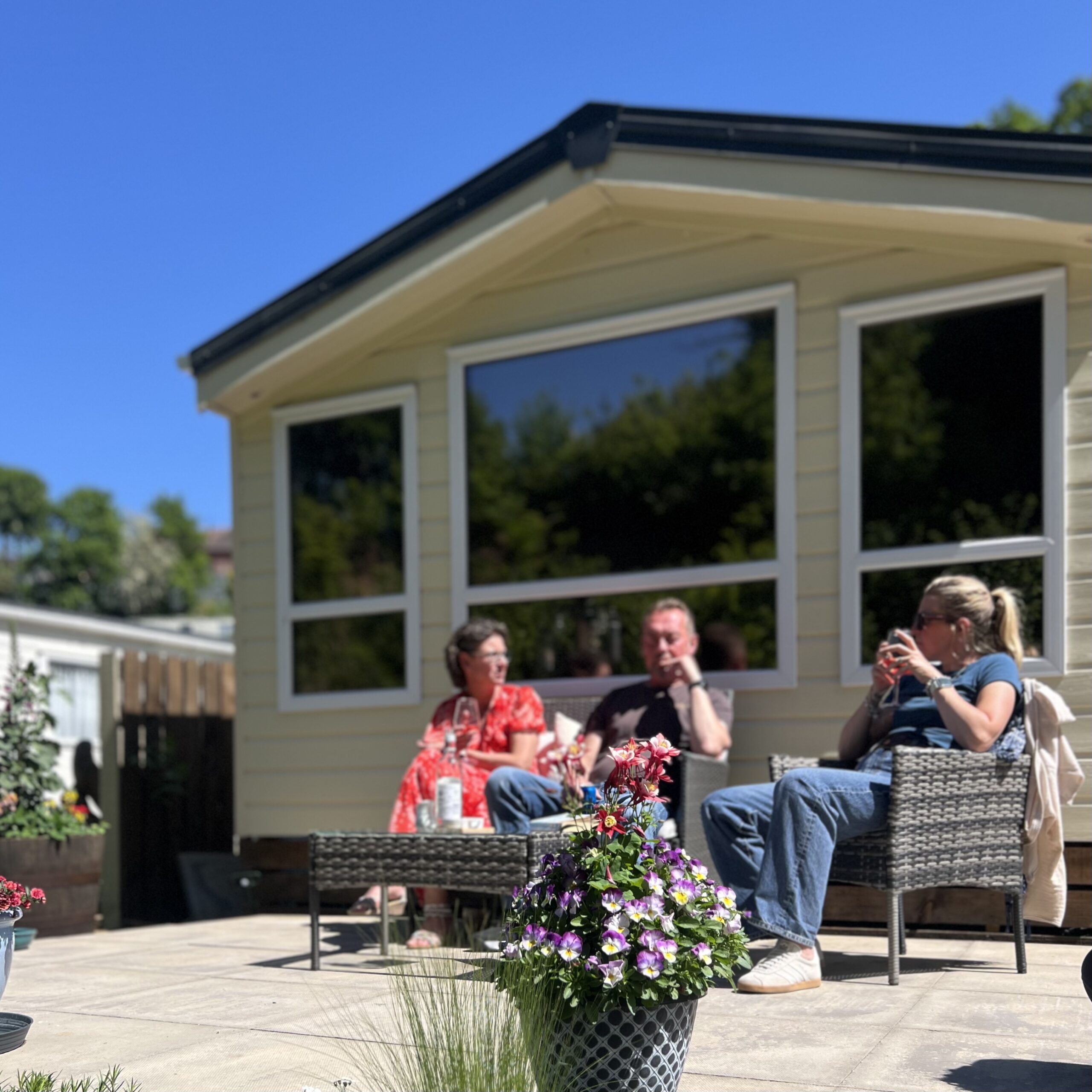 Holiday group outside a holiday home