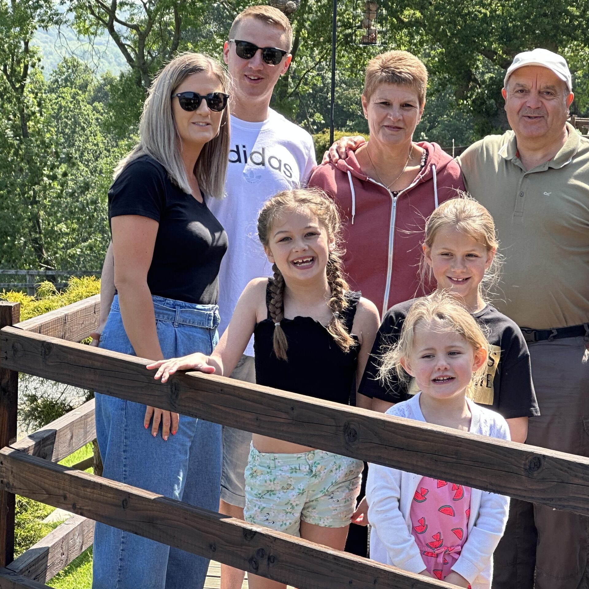 Family on decking at their holiday home