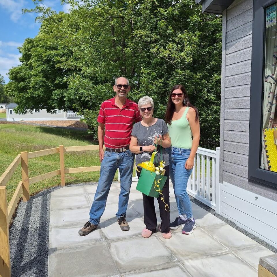 New owners of a holiday home celebrating