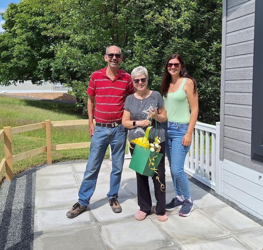 New owners of a holiday home celebrating